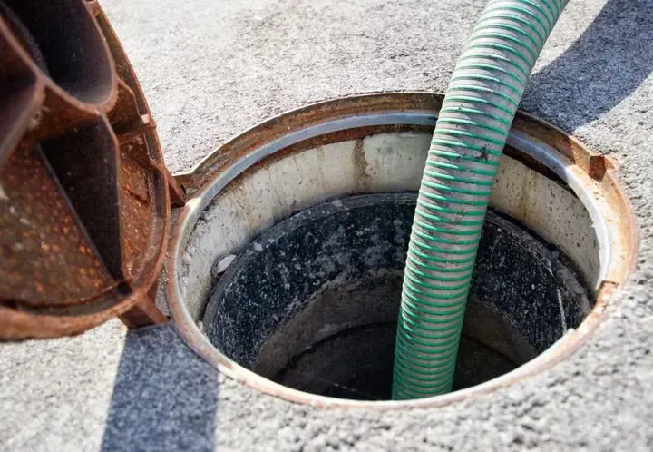 Sewer line cleaning through an outdoor access point